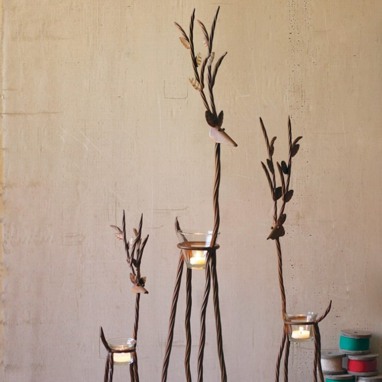 set of three rustic iron reindeer tea light candle holders | christmas decor | modern farmhouse christmas | rustic christmas decor | shop a dash of casual furniture, home décor, kitchenware, gifts, and art online or in store | Located inside the Corner Cartel in Boerne | best boerne shops for home decor vintage items accessories and gifts