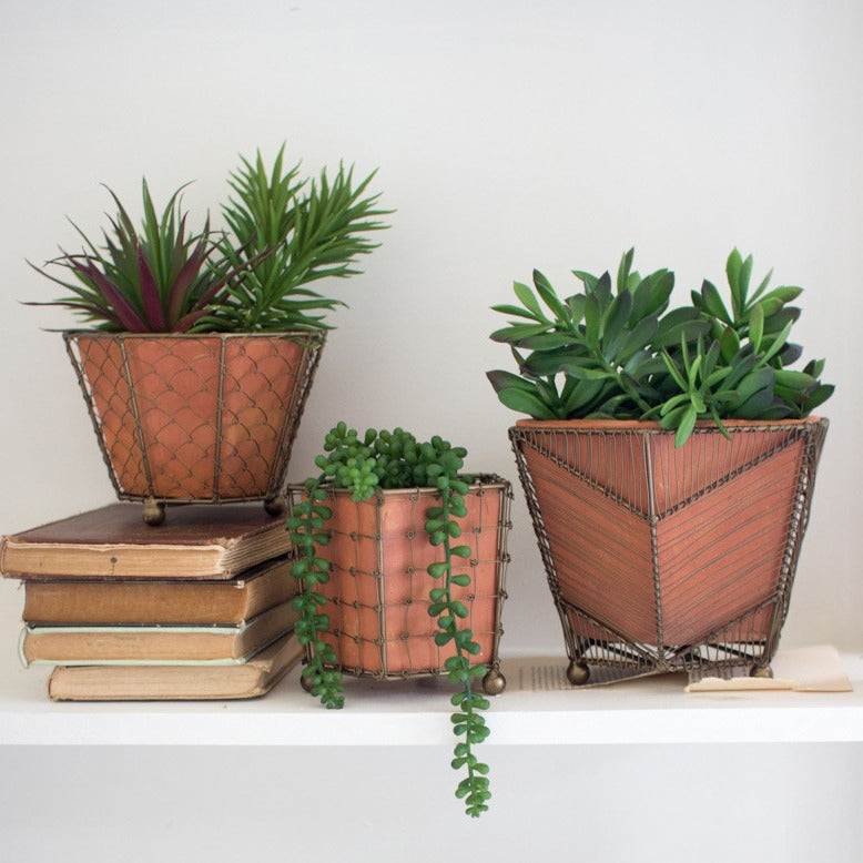 set of five teracotta planters with wire wrap | tera cotta planters | modern planters | shop a dash of casual furniture, home décor, kitchenware, gifts, and art online or in store | Located inside the Corner Cartel in Boerne | best boerne shops for home decor vintage items accessories and gifts