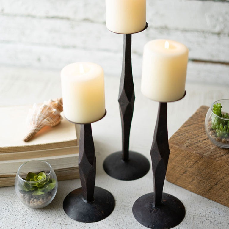 set of three forged iron candle stands | pillar candle holders | modern industrial home decor | farmhouse rustic decor | shop a dash of casual furniture, home décor, kitchenware, gifts, and art online or in store | Located inside the Corner Cartel in Boerne | best boerne shops for home decor vintage items accessories and gifts
