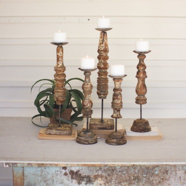 set of five repurposed wooden finial candle stands | pillar candle holders | farmhouse decor | industrial modern decor | shop a dash of casual furniture, home décor, kitchenware, gifts, and art online or in store | Located inside the Corner Cartel in Boerne | best boerne shops for home decor vintage items accessories and gifts