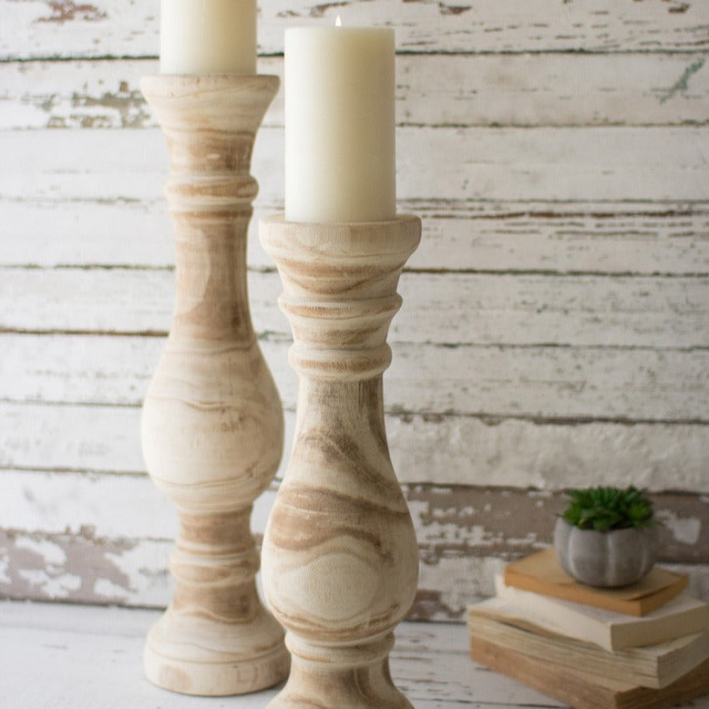 set of two hand carved wooden candle stands | wood candle holders | pillar candle holders | farmhouse decor and gifts | shop a dash of casual furniture, home décor, kitchenware, gifts, and art online or in store | Located inside the Corner Cartel in Boerne | best boerne shops for home decor vintage items accessories and gifts