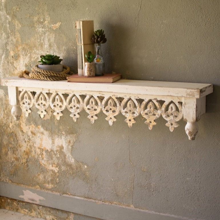 hand carved wooden shelf